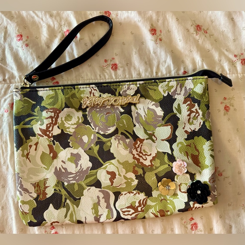Betsey Johnson wristlet. Like new condition.
